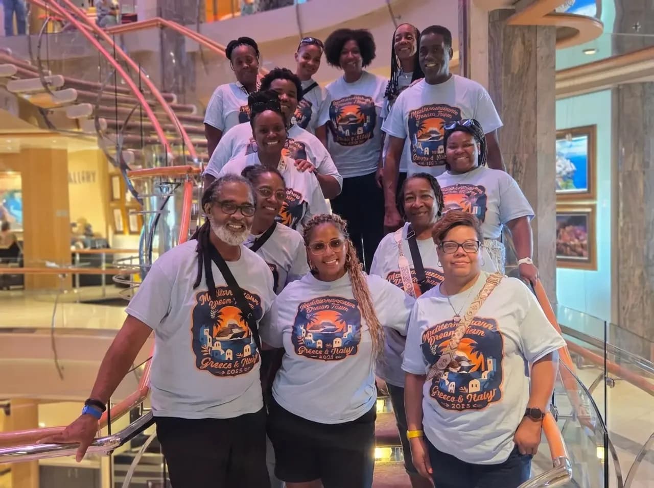 Yolanda with a group of happy travelers on a Mediterranean cruise