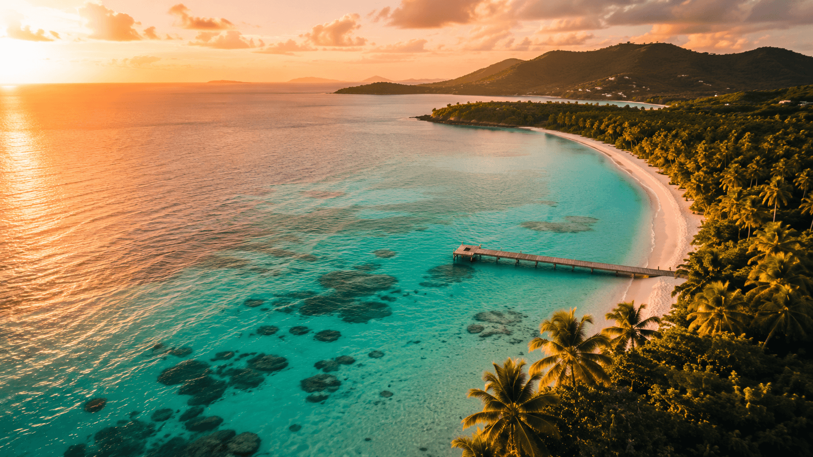 Cruise ship docked at a Caribbean port with turquoise water